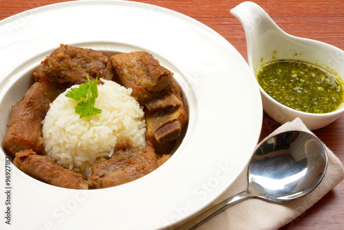 Grilled pork ribs with rice and spices