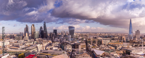 Panoramic skyline of London with Bank district including Stock Exchange Tower, Willis Building, Tower 42, Gherkin, Lloyd`s of London, the Shard and Canary Wharf at the background photo