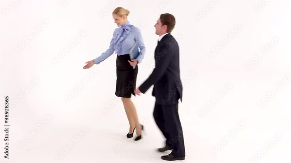 Businessman Comes to the Meeting/Businesswoman invites guest to go to the meeting Businessman Comes to the Meeting/Businesswoman invites guest to go to the meeting