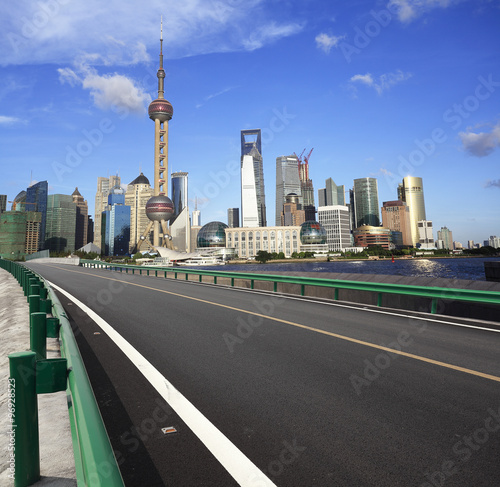 Photography Empty road surface with shanghai bund city buildings
