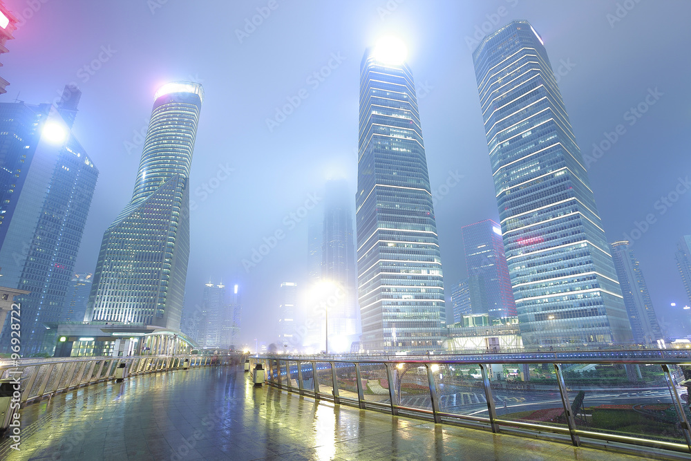 Obraz premium Empty marble floor road with modern city architecture background