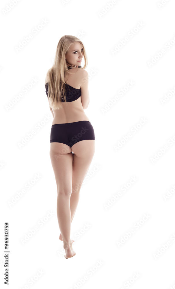 Rear view of athletic blonde posing in sportswear