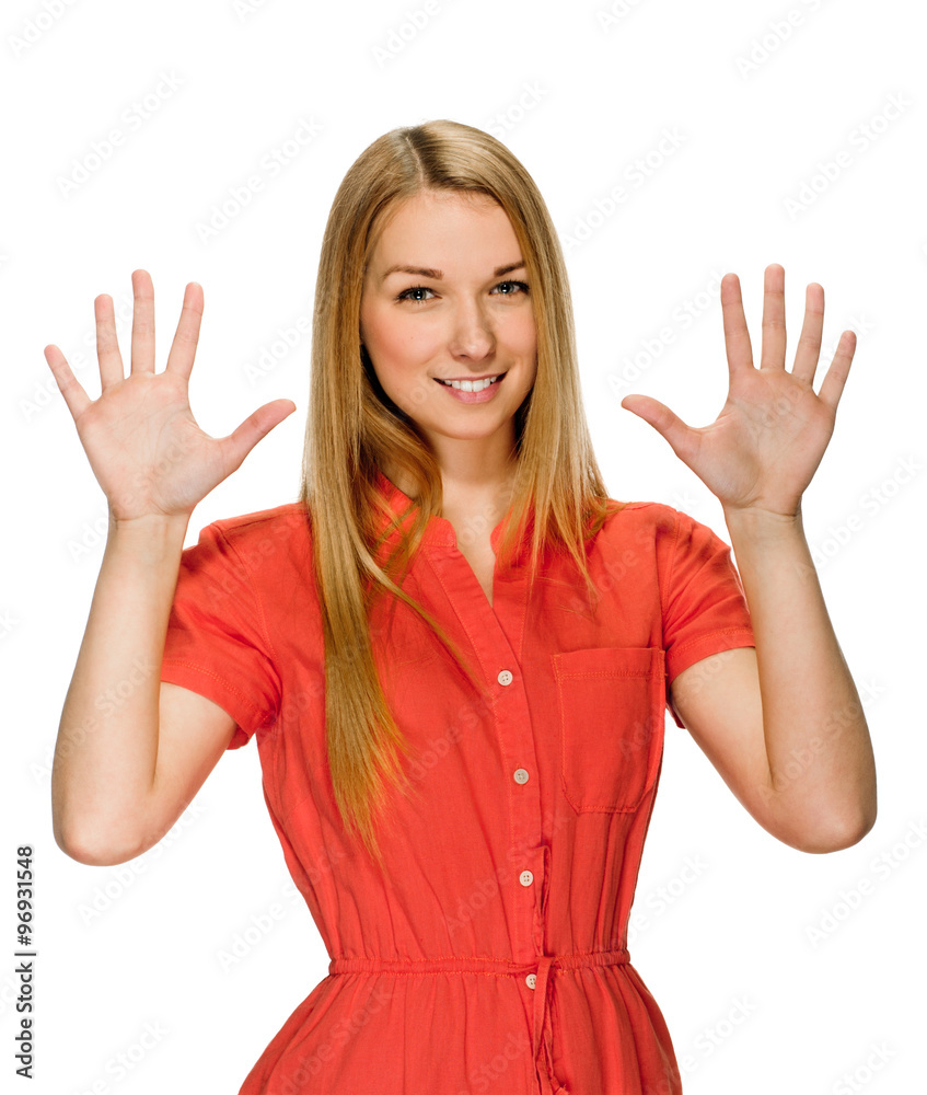 Portrait of happy smiling woman showing ten fingers Portrait of happy smiling woman showing ten fingers