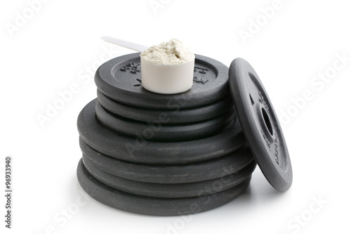 Dumbbell weight and whey protei photo