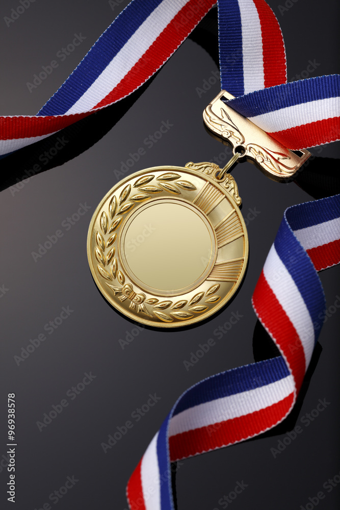 Foto Stock Gold medal on black background | Adobe Stock