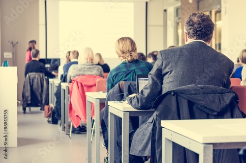 Audience at business conference.