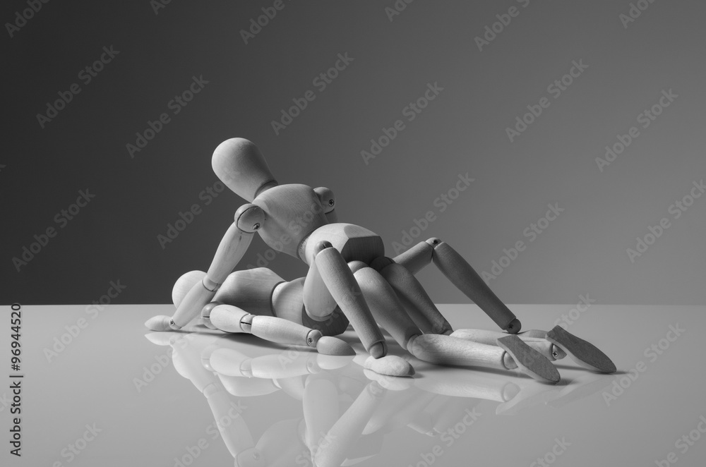 wooden figures having fun