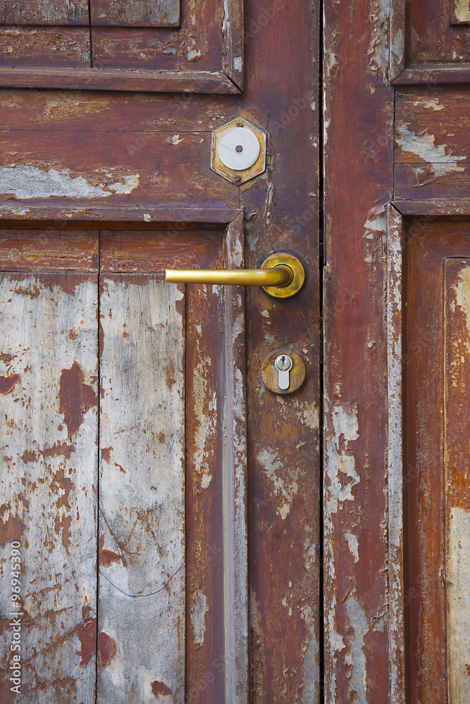 particolare di una vecchia porta di legno particolare di una vecchia porta di legno