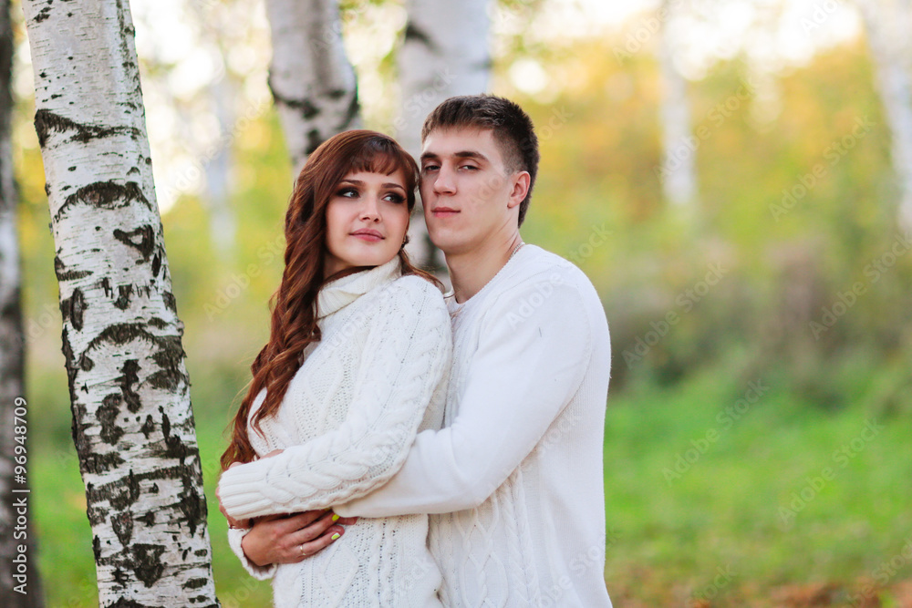 love, happy couple in park with birch trees, summer, autumn suns love, happy couple in park with birch trees, summer, autumn suns