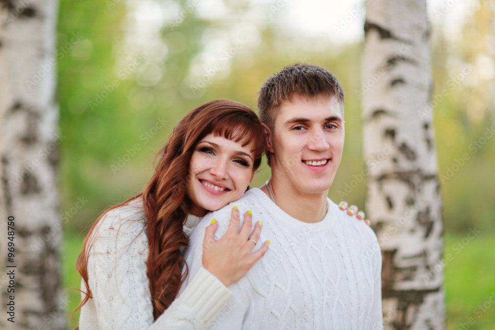 love, happy couple in park with birch trees, summer, autumn suns love, happy couple in park with birch trees, summer, autumn suns
