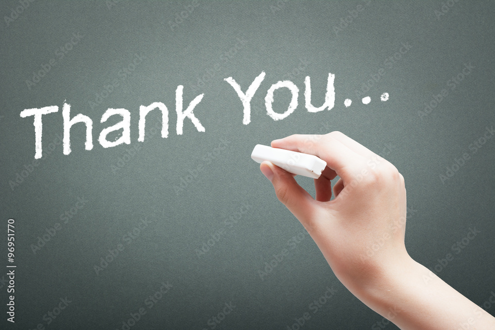 Hand writing with chalk thank you