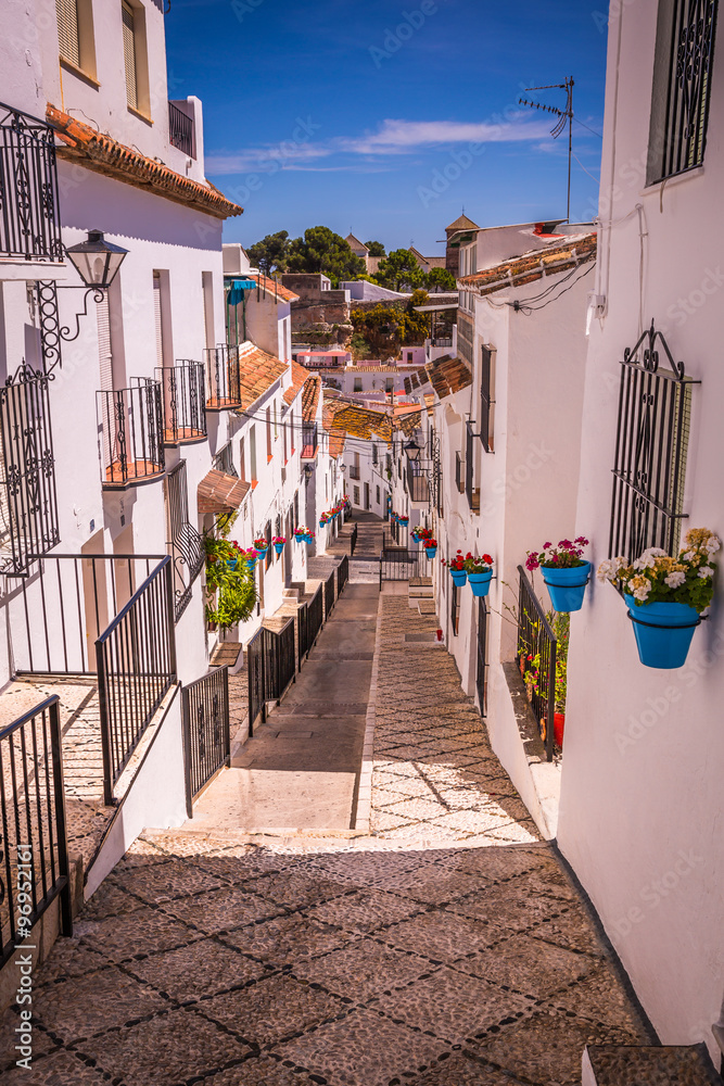 Obraz premium Picturesque street of Mijas. Charming white village in Andalusia