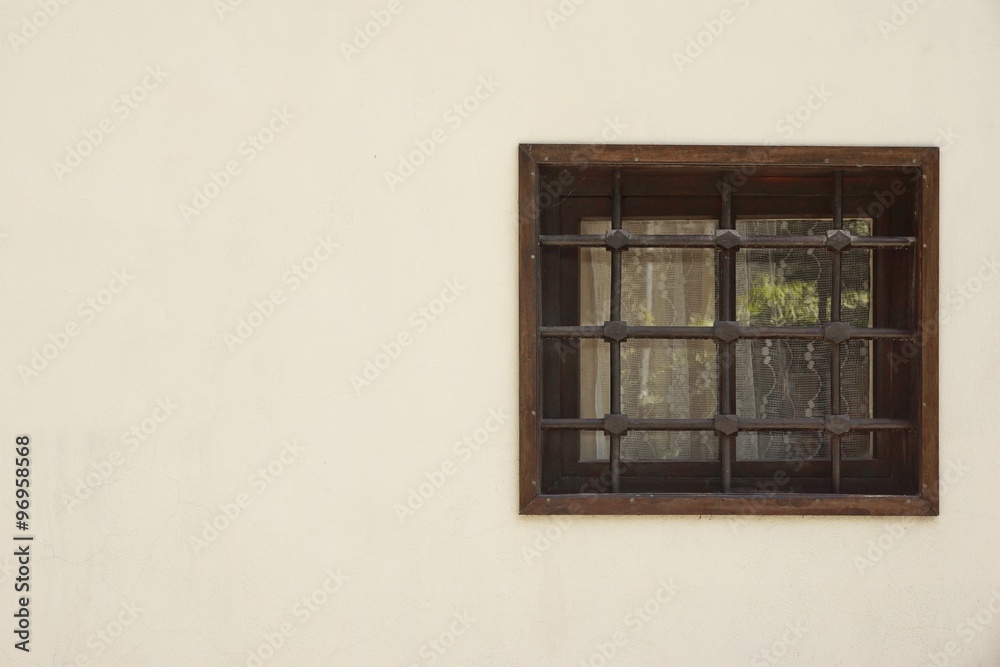 Fototapeta premium Old Window With Rusty Forged Bars