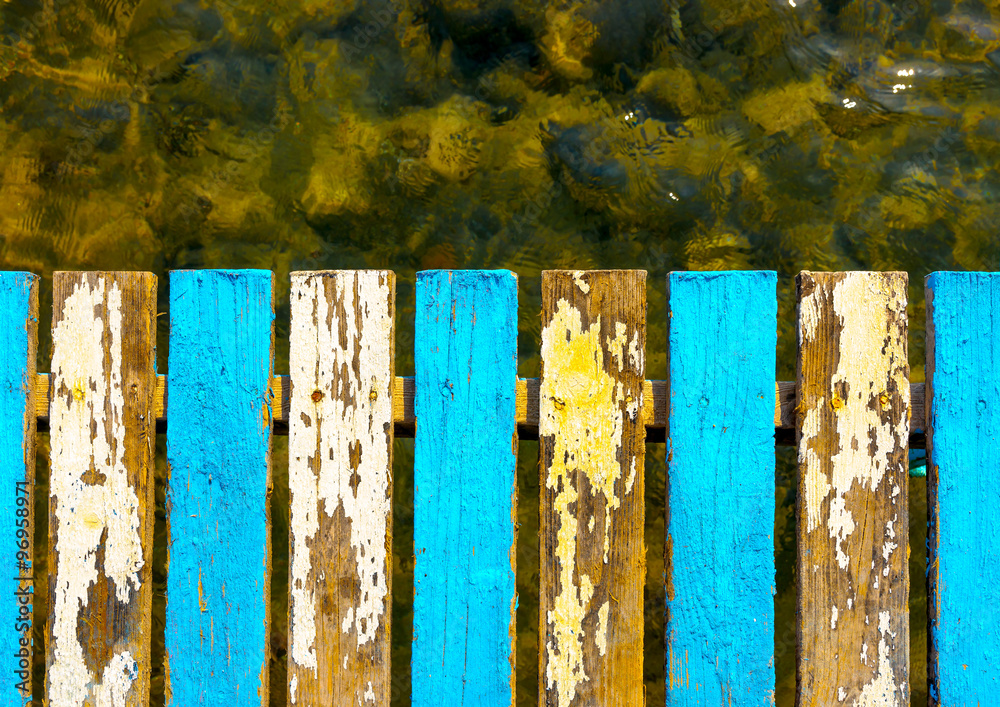 Beautiful wooden pier at a beach in kefalos area in Kos island in Greece Beautiful wooden pier at a beach in kefalos area in Kos island in Greece