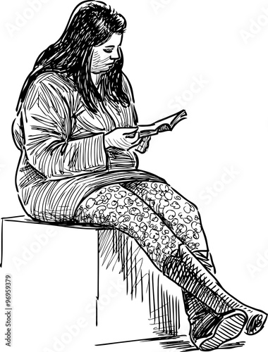 girl reads a book