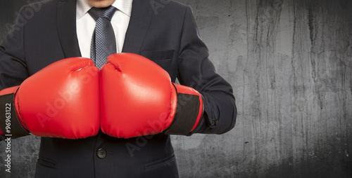 Businessman in red boxing gloves © Andrey Burmakin