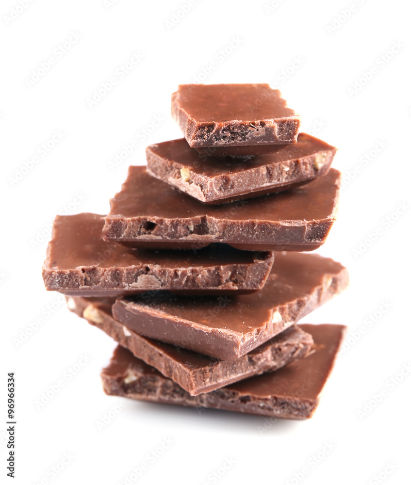 Milk chocolate pieces isolated on white Milk chocolate pieces isolated on white
