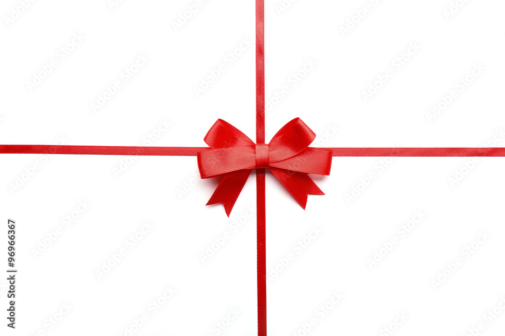 Shiny red ribbon with bow isolated on white Shiny red ribbon with bow isolated on white