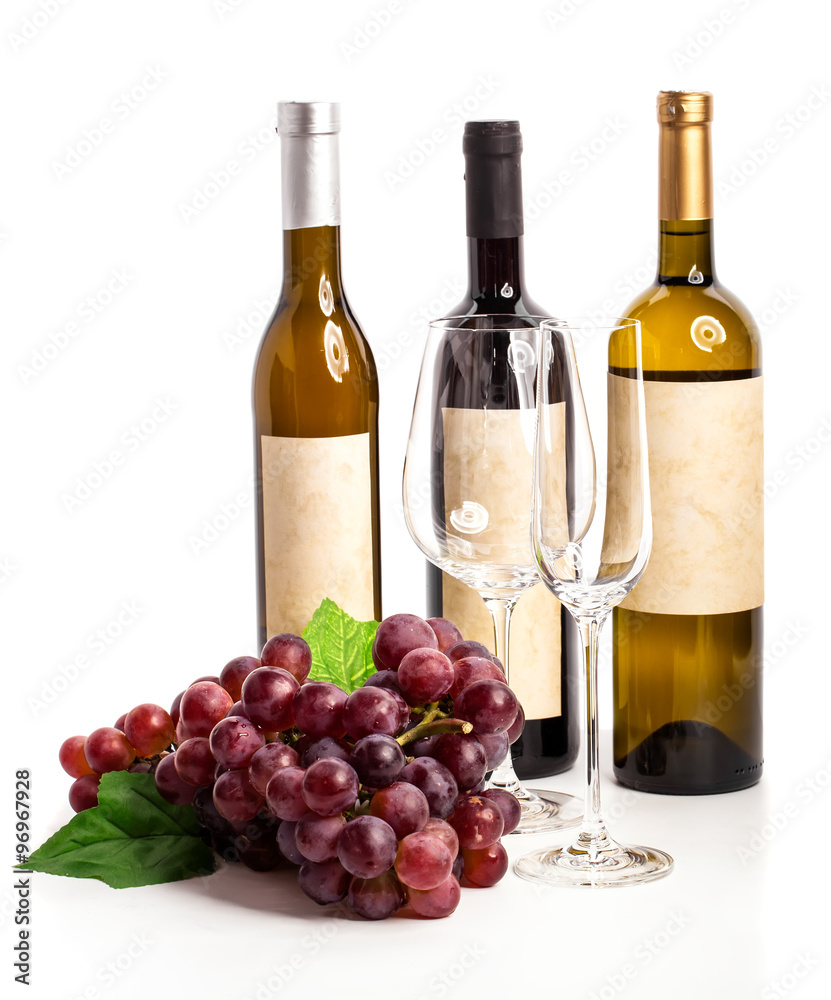 Bottle of red and white wine with grapes, white background