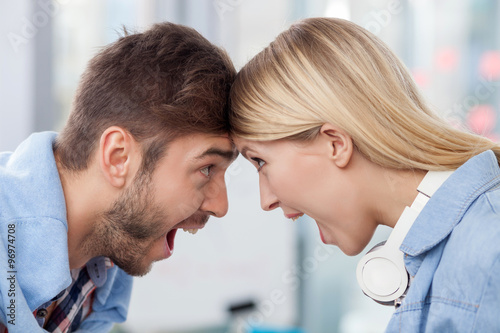 Φωτογραφία Attractive two designers are celebrating well-done job