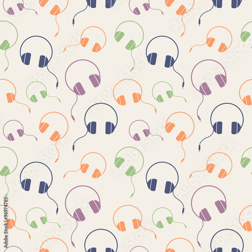 Seamless music vector pattern, chaotic background with colorful headphones, over light backdrop