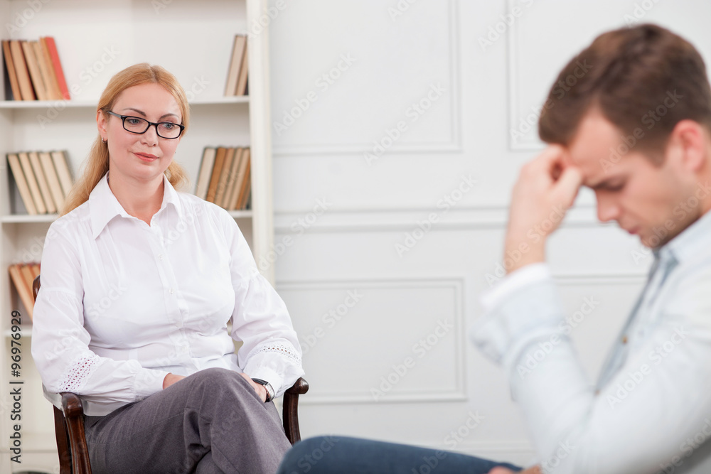 Professional female therapist is serving her patient Professional female therapist is serving her patient