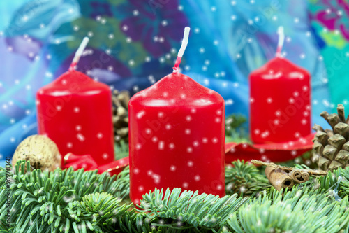 Advent wreath with red candles and snowflakes photo