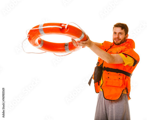 Lifeguard in life vest with ring buoy lifebuoy.