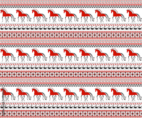 Seamless pattern with decorative elements of cosmogonic traditional folk art of northern region of Russia. Mezensky red horses. Illustration photo