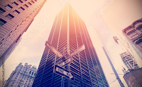 Retro old film style photo of street signs in Manhattan, NYC