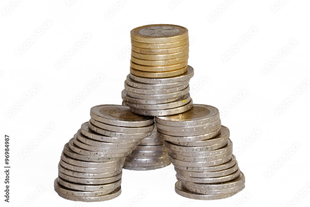 An unstable pile of Euro coins, about to collapse An unstable pile of Euro coins, about to collapse