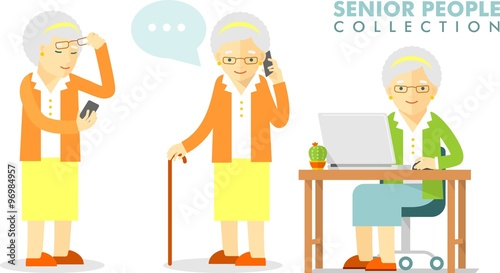 Social concept - old woman using computer and mobile phone