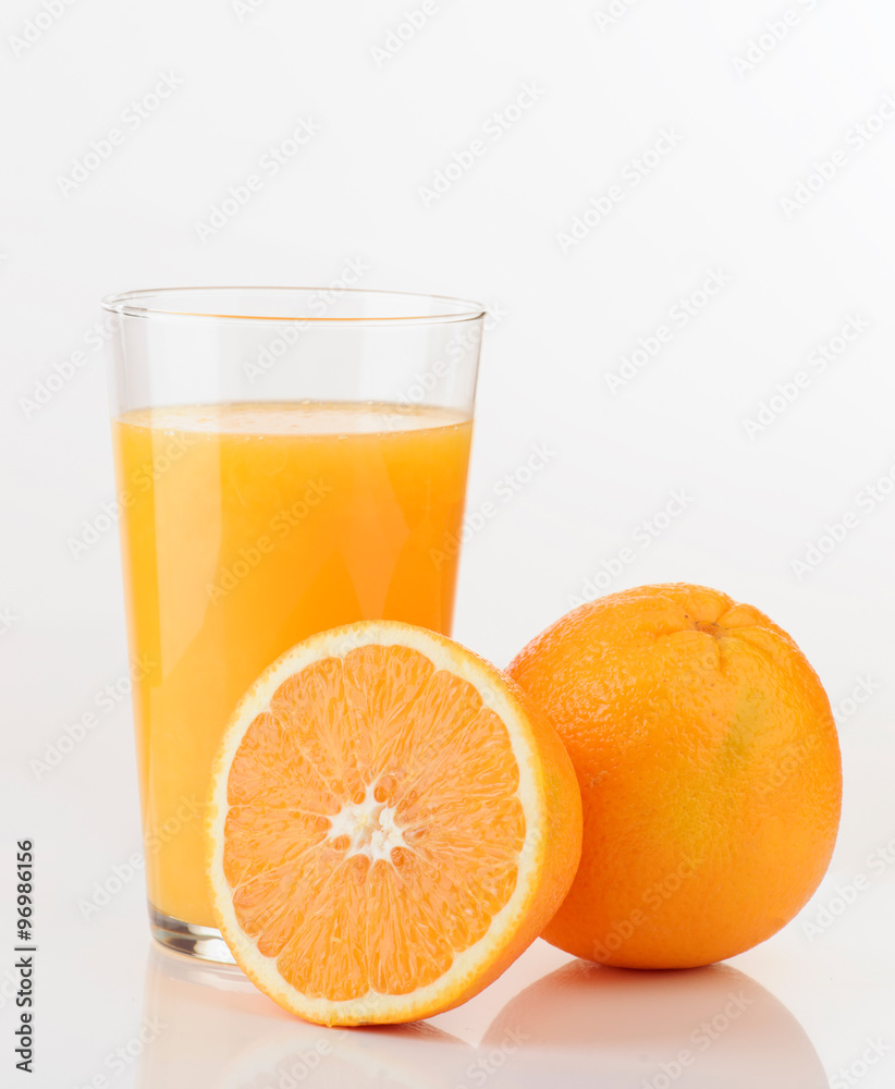 glass of orange juice and orange pieces glass of orange juice and orange pieces