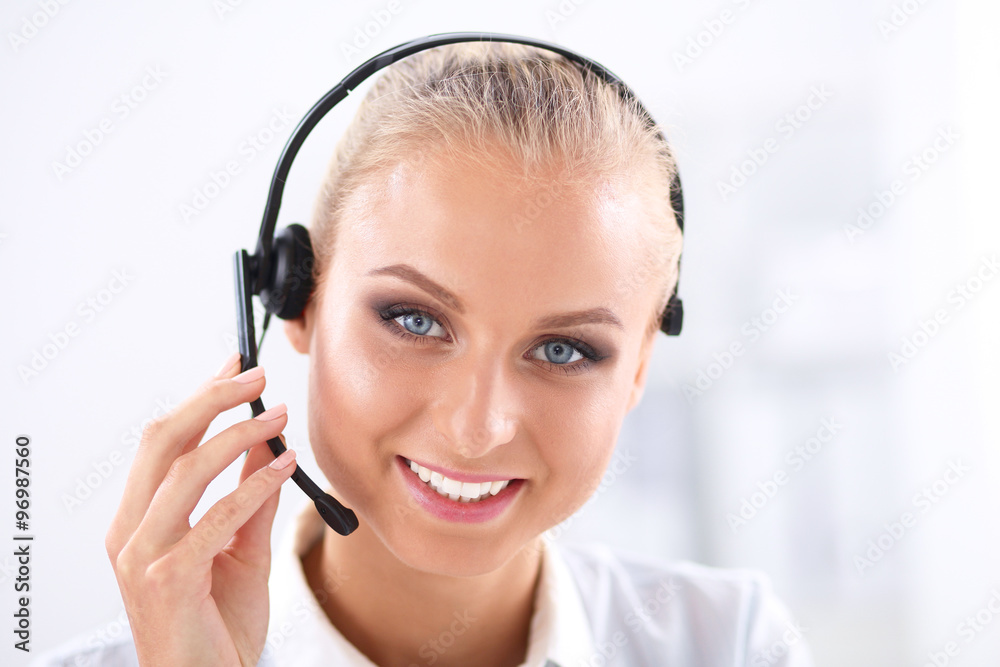 Close-up portrait of a customer service agent sitting at office Close-up portrait of a customer service agent sitting at office