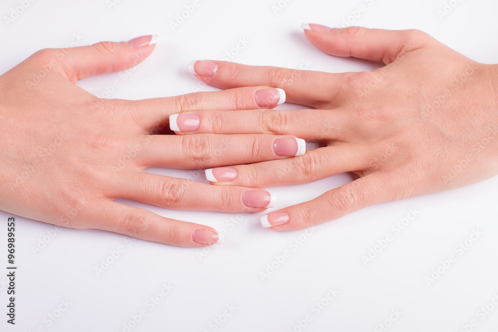 Well-groomed female hands and nails.