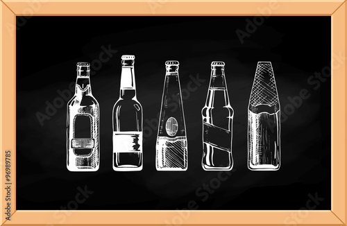 Beer set on blackboard.