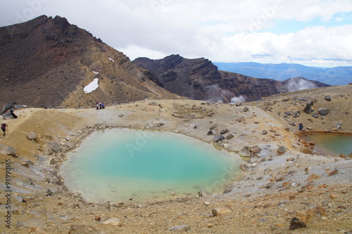 Water-filled explosion craters called the Emerald Lake