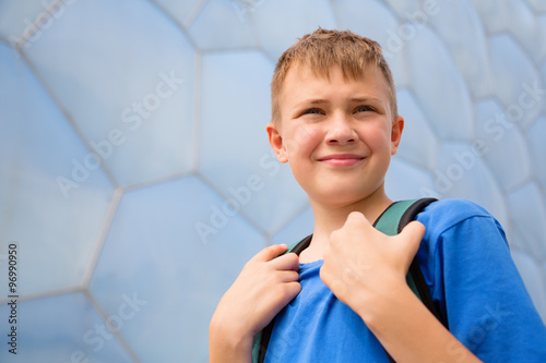 Boy with the backpack in the Olympic Park in Beijing photo