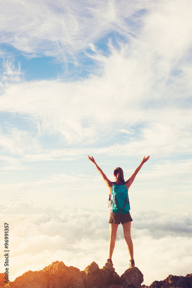 Happy Woman Hiker With Open Arms at Sunset on Mountain Peak Happy Woman Hiker With Open Arms at Sunset on Mountain Peak