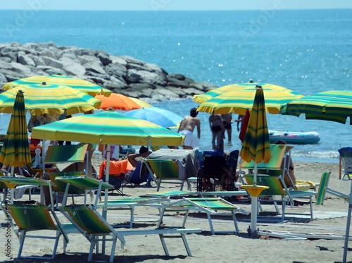 colorful parasol on the beach during the hot summer