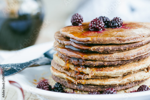 Whole wheat oatmeal pancakes with blackberry and syrup