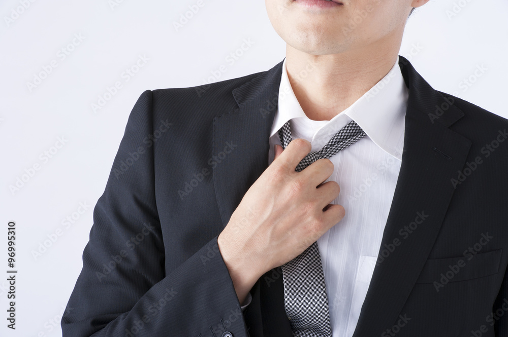 ネクタイを緩める男性 Stock-Foto | Adobe Stock