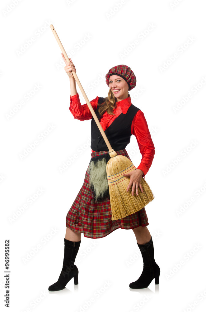 Funny woman in scottish clothing with broom Funny woman in scottish clothing with broom