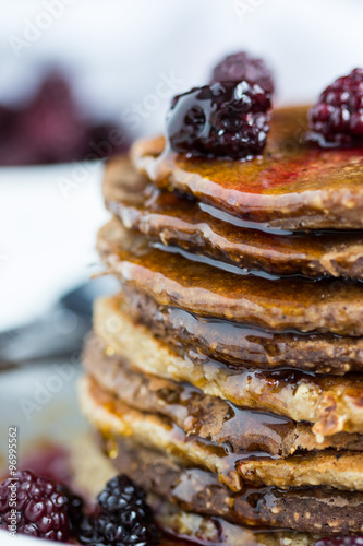 Whole wheat oatmeal pancakes with blackberry and syrup