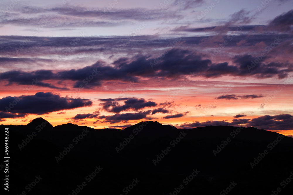 Sunrise and the silhouette of the mountain