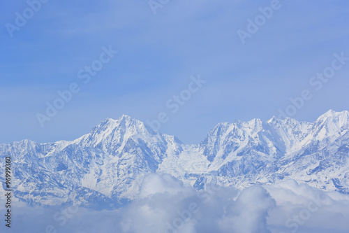 beautiful rolling clouds and snow mountain landscape © lzf