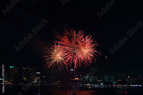 fireworks at the sea and city on background © rukawajung