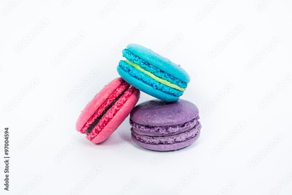three macarons on a white background three macarons on a white background