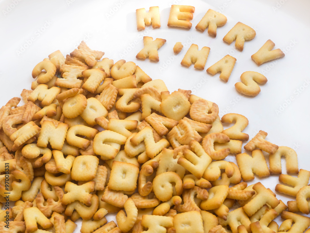 alphabet cracker with word Merer X's mas on white background alphabet cracker with word Merer X's mas on white background