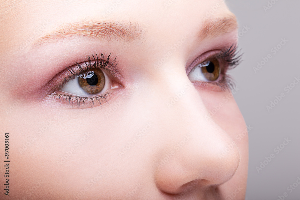 Fototapeta premium Close-up of female face with eyes makeup